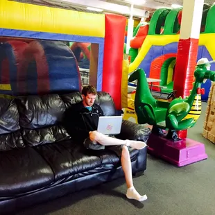 Comfortable leather coaches are throughout the facility.