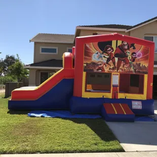 Our Modular 13&apos; x 13&apos; Bounce House Combo with a dry slide