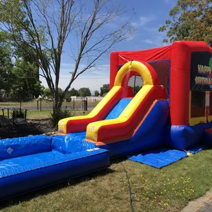 Our Modular 13&apos; x 13&apos; Bounce House Combo with a Waterslide