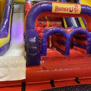 Vertical Rush climbing wall and slide