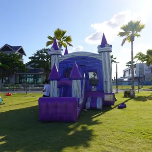 This is our cheapest wet bouncer with a pool! Water slides