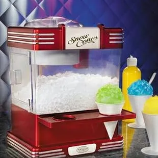Summer favorite Snow cone machine ( Hawaiian Punch syrup available upon request )