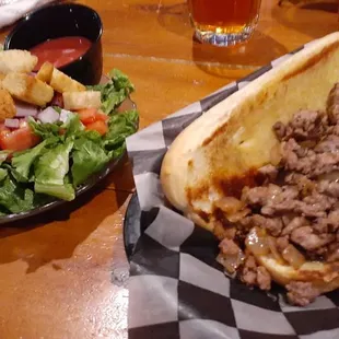 Steak sandwich and side salad