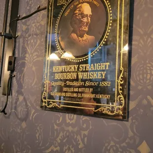 a plaque on the wall of a restaurant