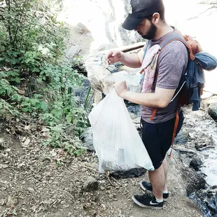 Picking up the trash cause people can't clean up after themselves like an untaught child