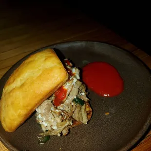 a plate of food on a wooden table
