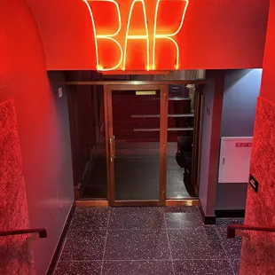 the entrance to a bar