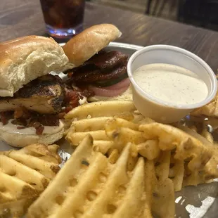 Brisket slider and chicken bacon ranch slider with waffle fries and a side of ranch