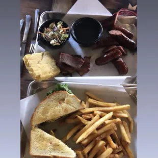 a plate of food with fries and a sandwich