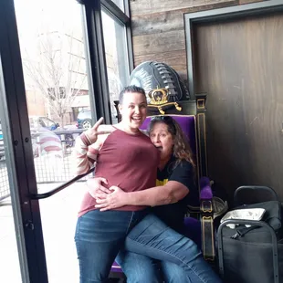 Sitting on the throne cuz we're queens.