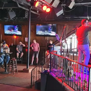 a group of people at a bar
