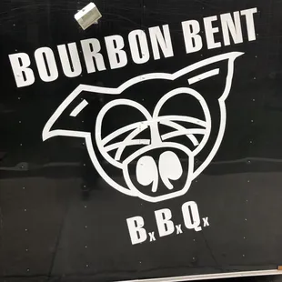 he logo on the side of the truck