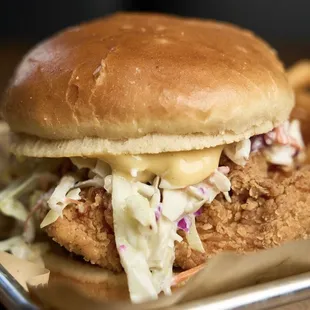 "Lucky Clucker" - marinated chicken, pineapple coleslaw, honey mustard, pickles.