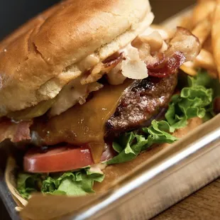 Bent burger - awesome sauce, burger, lettuce, onion, pickles, tomatoes. Bacon -optional