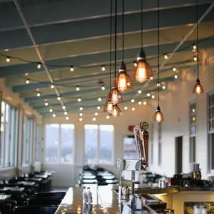 The Sun Room at Bourbon Brothers features a private 1/2 bar, a full front patio, and breathtaking views. Available for private bookings.