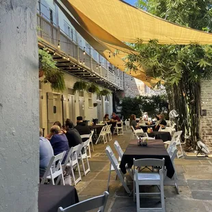 outdoor dining area with tables and chairs