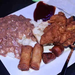Fried chicken, wings, Thai spring rolls, red beans &amp; rice, and alligator sausage