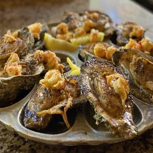 Charbroiled Oysters topped with Crawfish. My fave :)...
