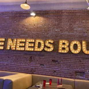 Lighted sign on the wall