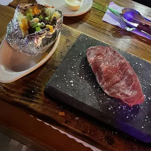 Steak on a hot stone. Extremely tender. Have to get this again!