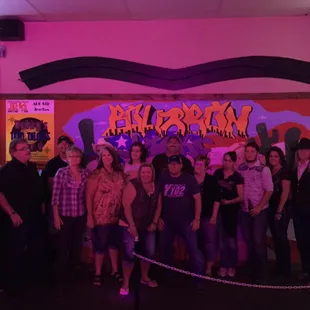 a group of people posing for a picture