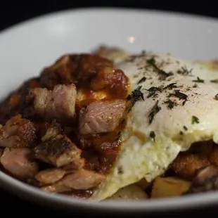 an omelet with meat and potatoes