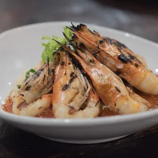 a plate of grilled shrimp