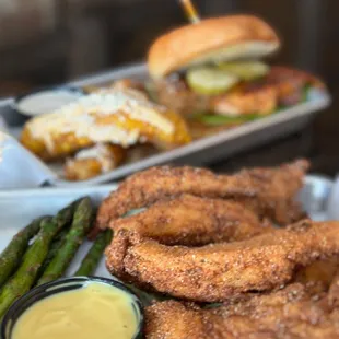 onion rings, asparagus, and a burger