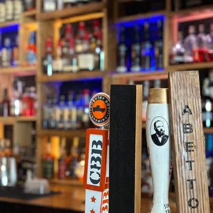 a beer tap and a beer glass