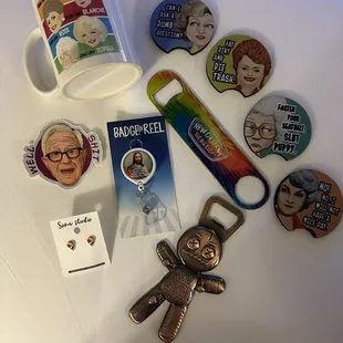 Coffee cup, neoprene car coasters, 2x bottle opener, badge reel, locally made snowball hypoallergenic earrings, Leslie Jordan sticker