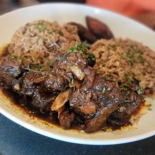 Oxtail and double rice and peas and plantains