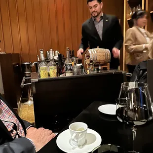 Table side hand crafted smoked cocktail.