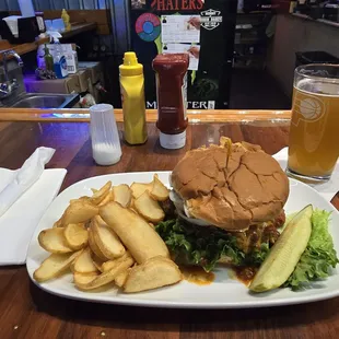 Chili cheese burger with fries. Deliciously messy! I recommend wearing a bib when you order one