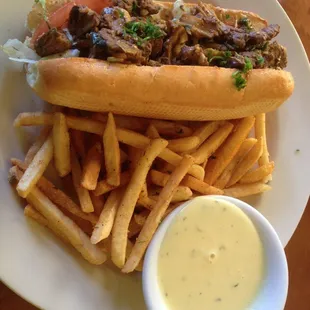 Sirloin Po&apos; Boy. A bit to much garlic for me. Sirloin was very overcooked and chewy. Delicious honey-mustard and fries