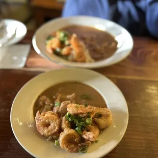 The small bowl of Gumbo with Cajun Shrimp added &amp; Large bowl of Gumbo with Cajun Shrimp added. So so good!