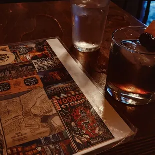 a drink and a newspaper