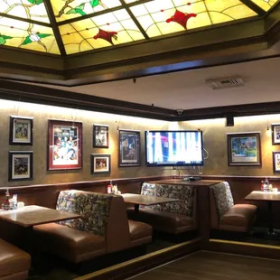 seating and stained glass ceiling