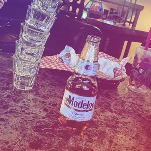 a bottle of modelo on a table