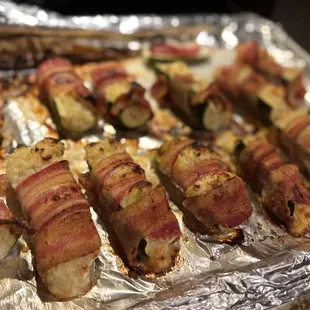 Bacon wrapped and stuffed zucchini