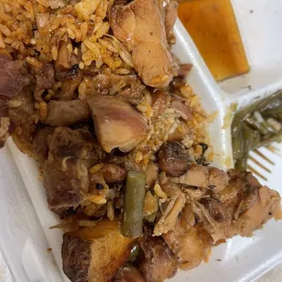 chicken and rice in a styrofoam container