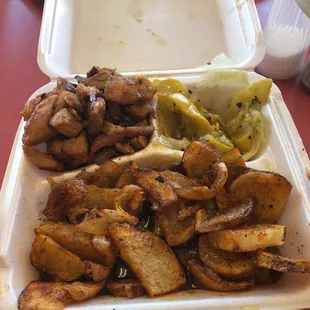 Bourbon chicken, Cajun potatoes and steamed vegetables