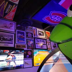 a wall full of sports memorabilia