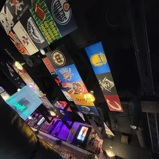 a bar with neon signs