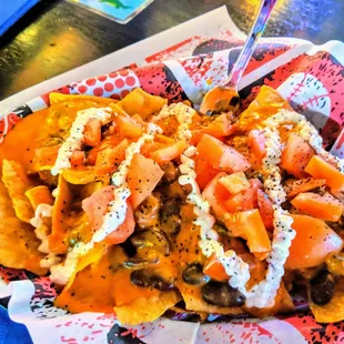 Chili nachos add tomatoes.