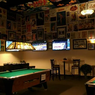 a pool table and pool tables in a bar