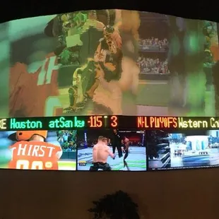 a large display of television screens