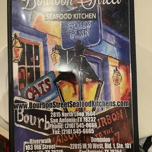 a sign for bourbon street
