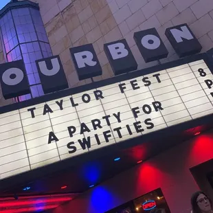 a crowd of people standing outside