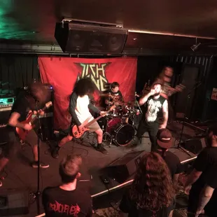 a band performing on stage