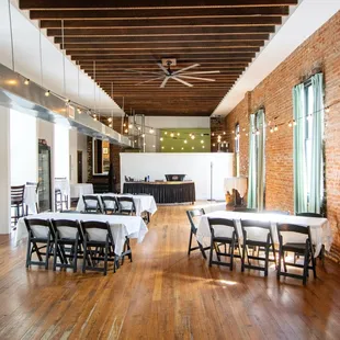 a room with tables and chairs